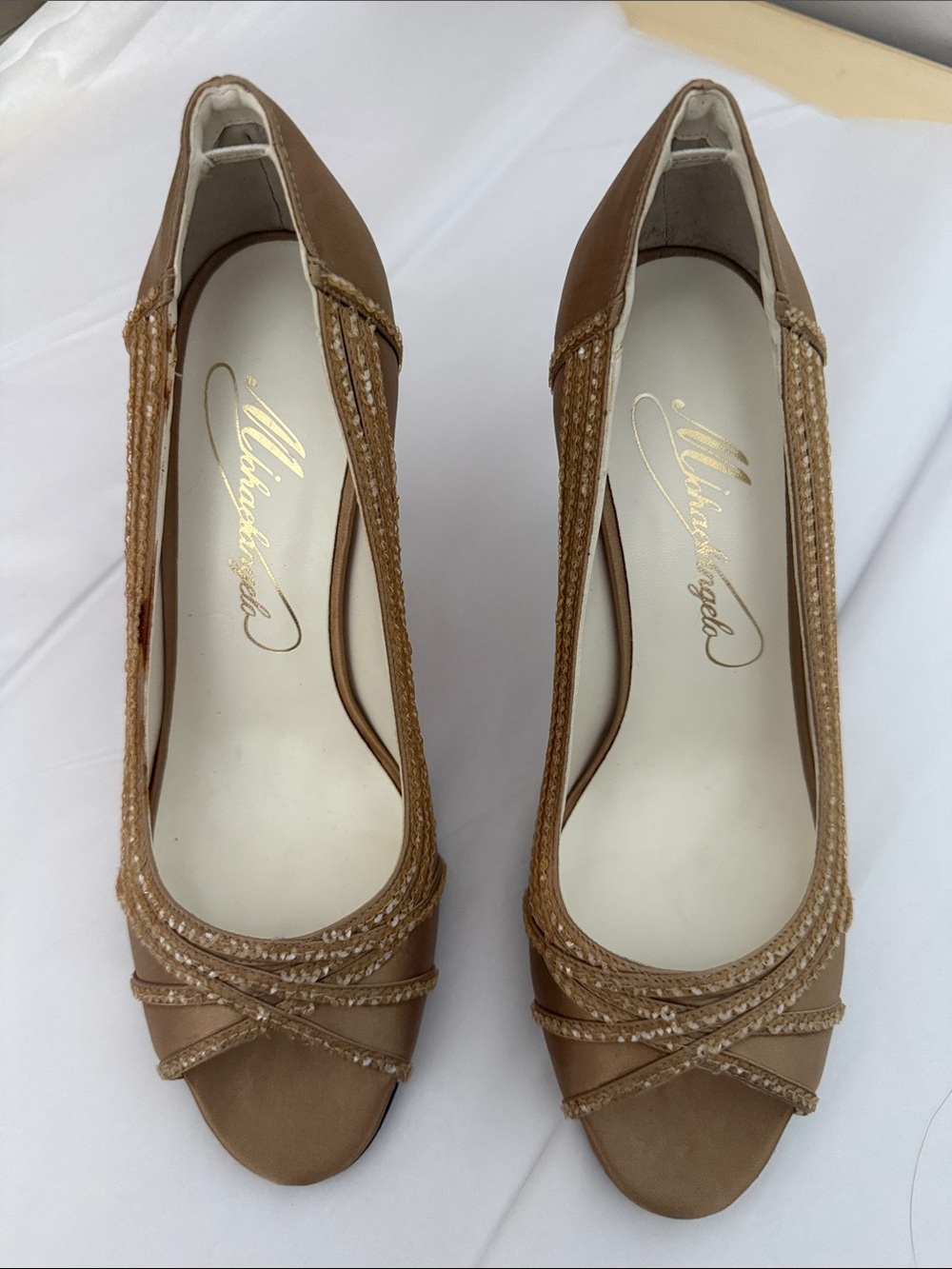 David Bridal Michaelangelo Shoes.   Size 5.5.  Never worn.  Gold 3” Heel